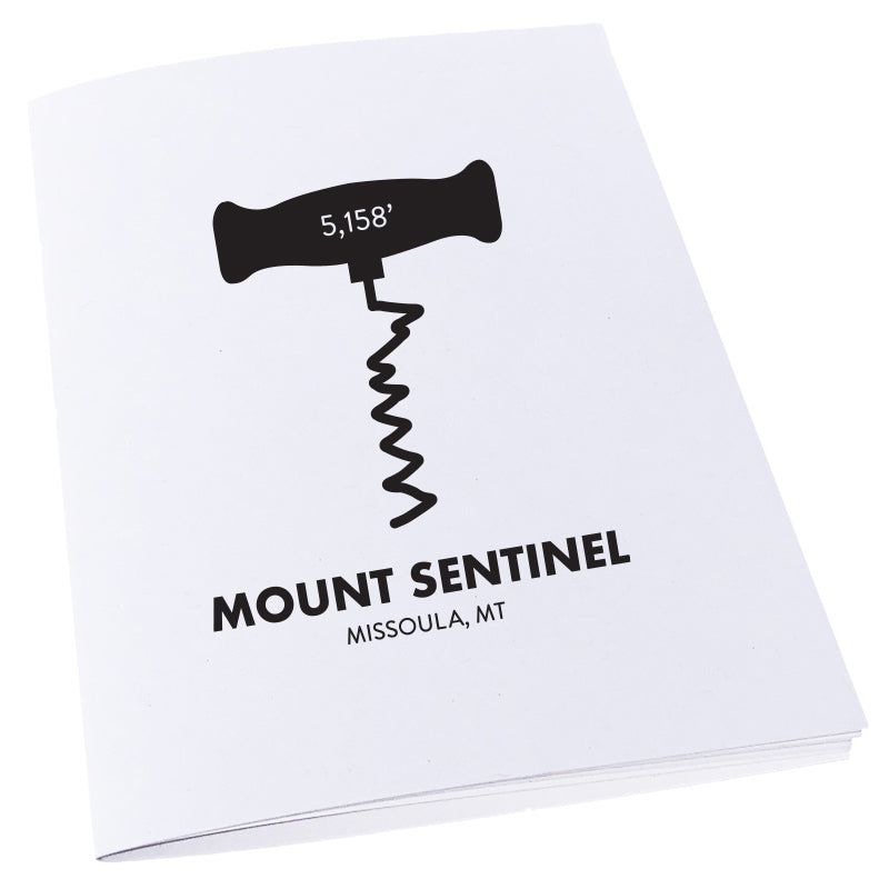 The M trail on Mount Sentinel in Missoula, MT as a corkscrew on a notebook.