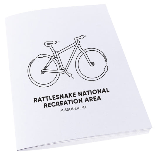Mountain Bike made out of snakes to represent the Rattlesnake National Recreation Area near Missoula, MT on a notebook.