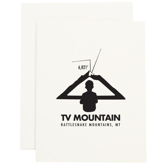 Image of a boy looking at a mountain as if it is a television to represent TV Mountain in Missoula, MT on a greeting card.