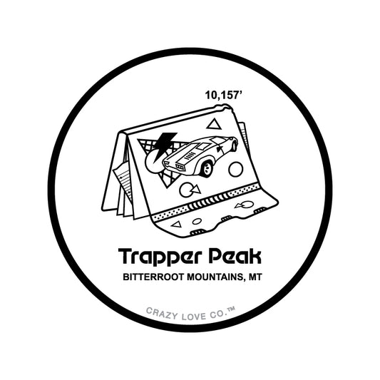 Image of a seventies era notebook with a car on it to represent Trapper Peak in the Bitterroot Mountains of Montana on a sticker.