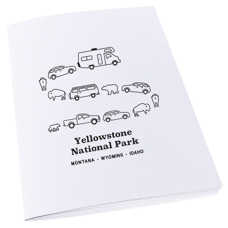 Image of a traffic jam at Yellowstone National Park in Montana, Wyoming, and Idaho with cars, campers, bears, and bison on a notebook.