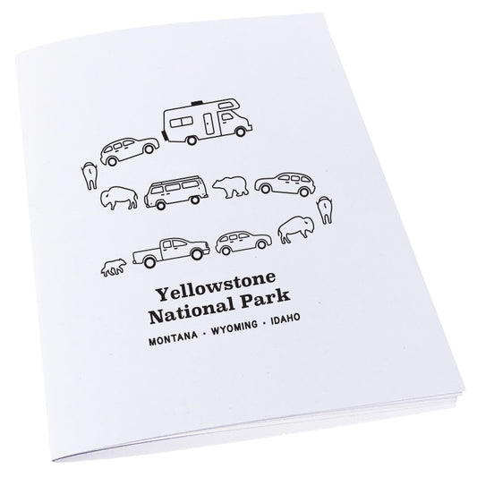 Image of a traffic jam at Yellowstone National Park in Montana, Wyoming, and Idaho with cars, campers, bears, and bison on a notebook.